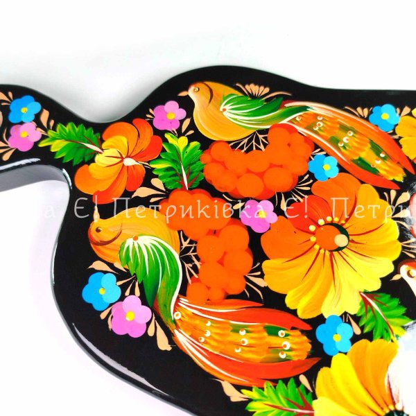 Large pear-shaped kitchen cutting board with Petrykivka painting “Three cuckoos” (31x18 cm)